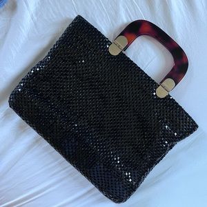 Black metal chain links handbag with magnet closure and extra storage